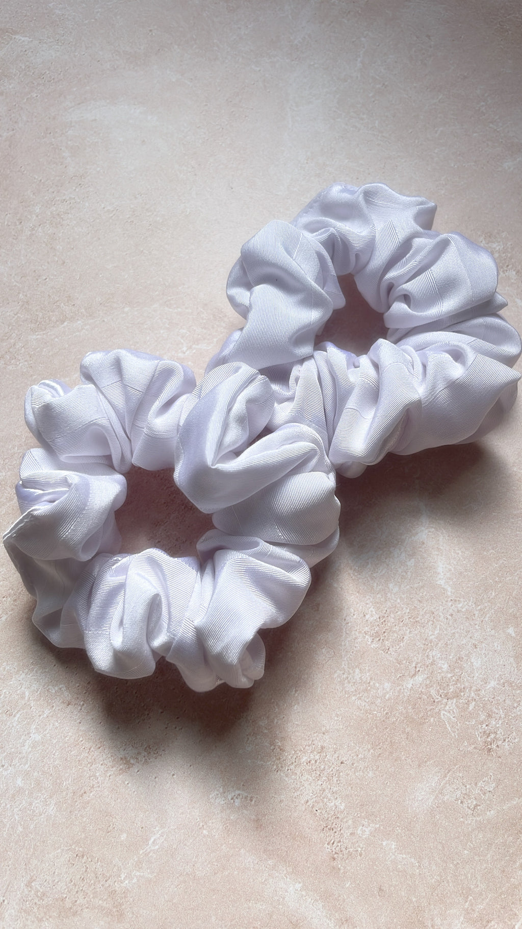Chouchou cheveux en tissu – Maintien confortable sans casser