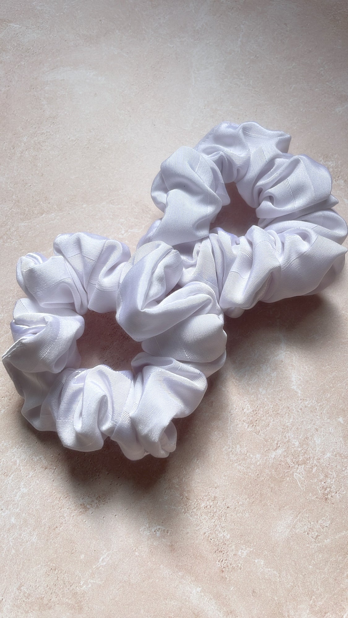 Chouchou cheveux en tissu – Maintien confortable sans casser